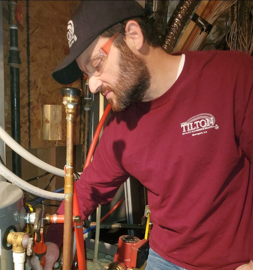 Mike Tilton on a plumbing job
